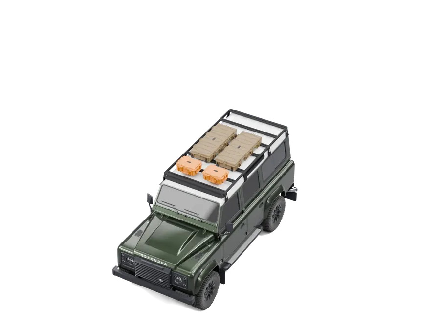 Airholder Dachträger Montage am Land Rover Defender 110: Rahmen aus B- und S-Profilen, Ecken, Füße, Rack aufs Dach, Klemmen an der Regenrinne, Koffer